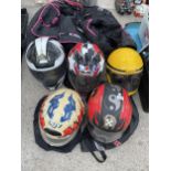 FIVE VARIOUS MOTOR BIKE HELMETS AND A MOTOR BIKE JACKET