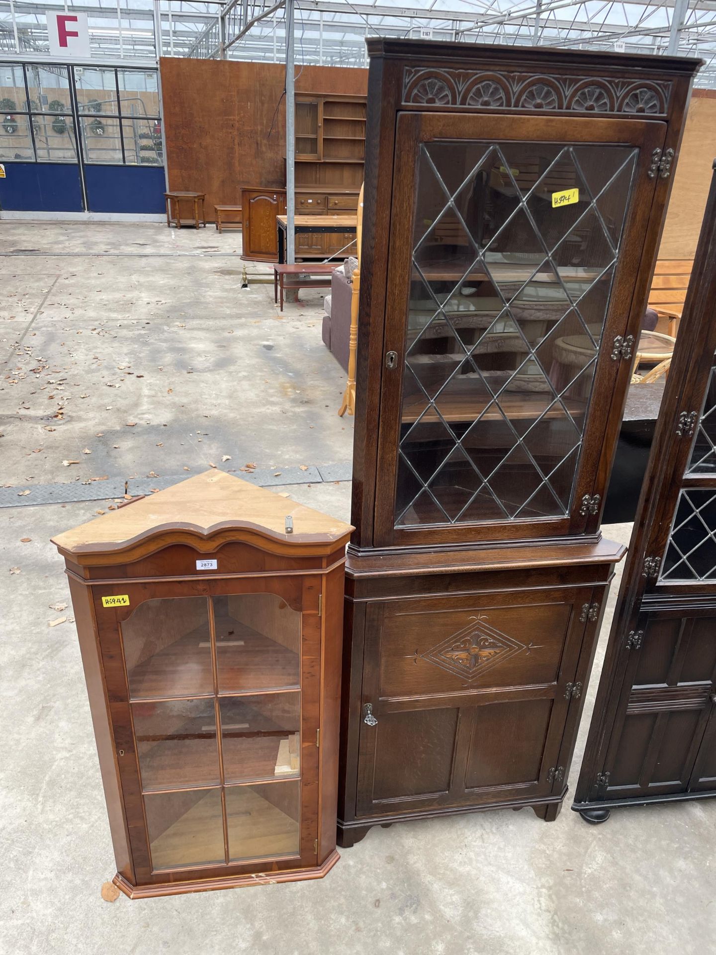 YEW WOOD CORNER CUPBOARD AND OAK CORNER CUPBOARD WITH GLAZED AND LEADED UPPER PORTION