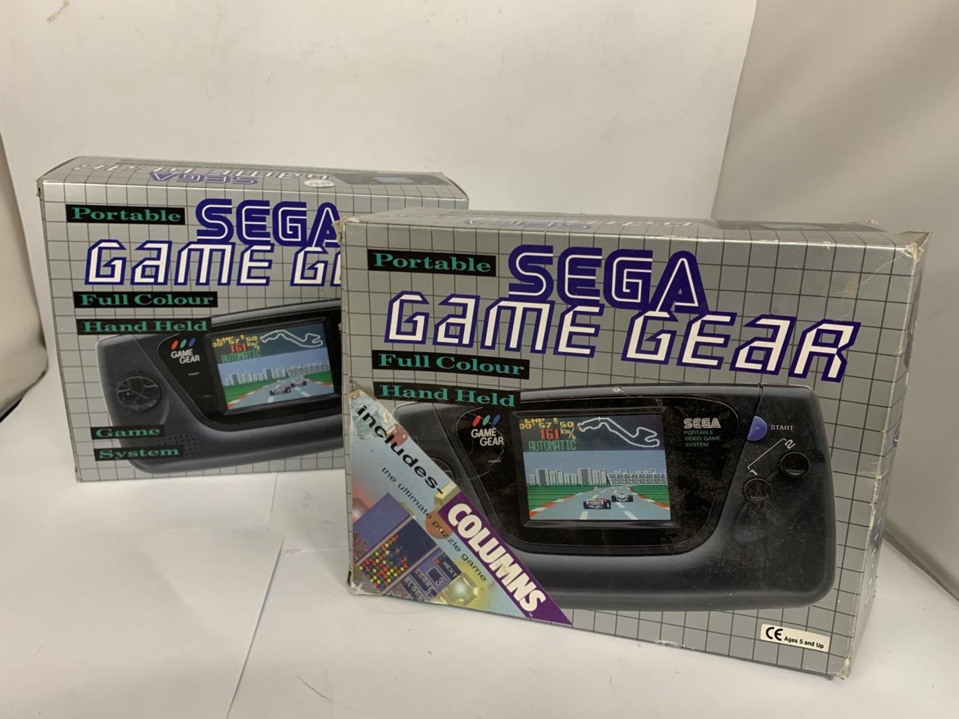 A PORTABLE SEGA GAME GEAR HAND HELD GAME SYSTEM (BOXED) WITH SPARE BOX