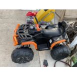 A KID TRAX BATTERY OPERATED CHILDS RIDE ALONG QUAD BIKE
