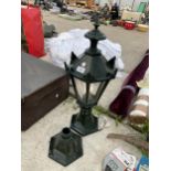 A DECORATIVE OUTSIDE POST TOPPER LIGHT FITTING