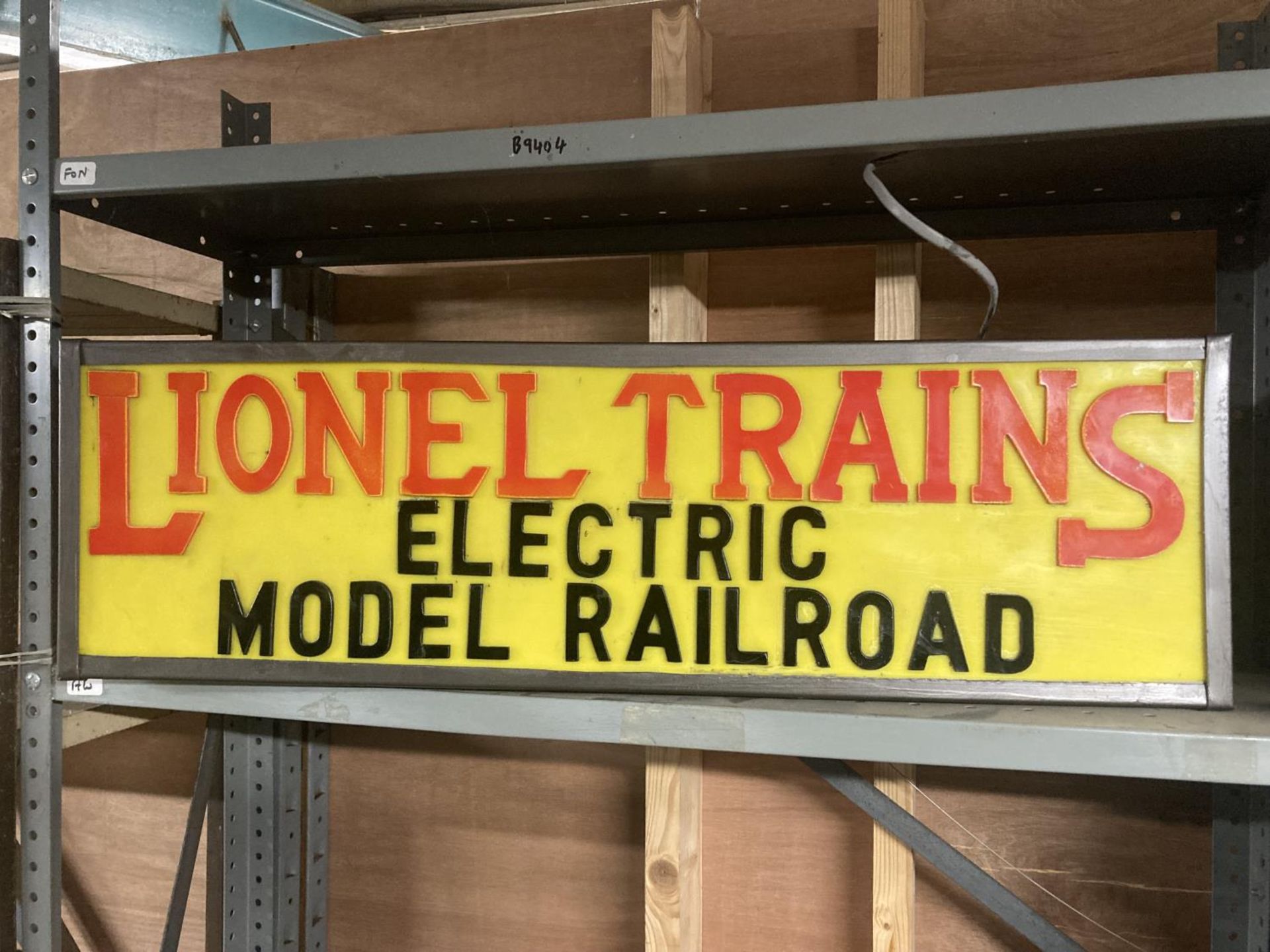 A LIONEL TRAINS ELECTRIC MODEL RAILROAD ILLUMINATED LIGHTBOX SIGN