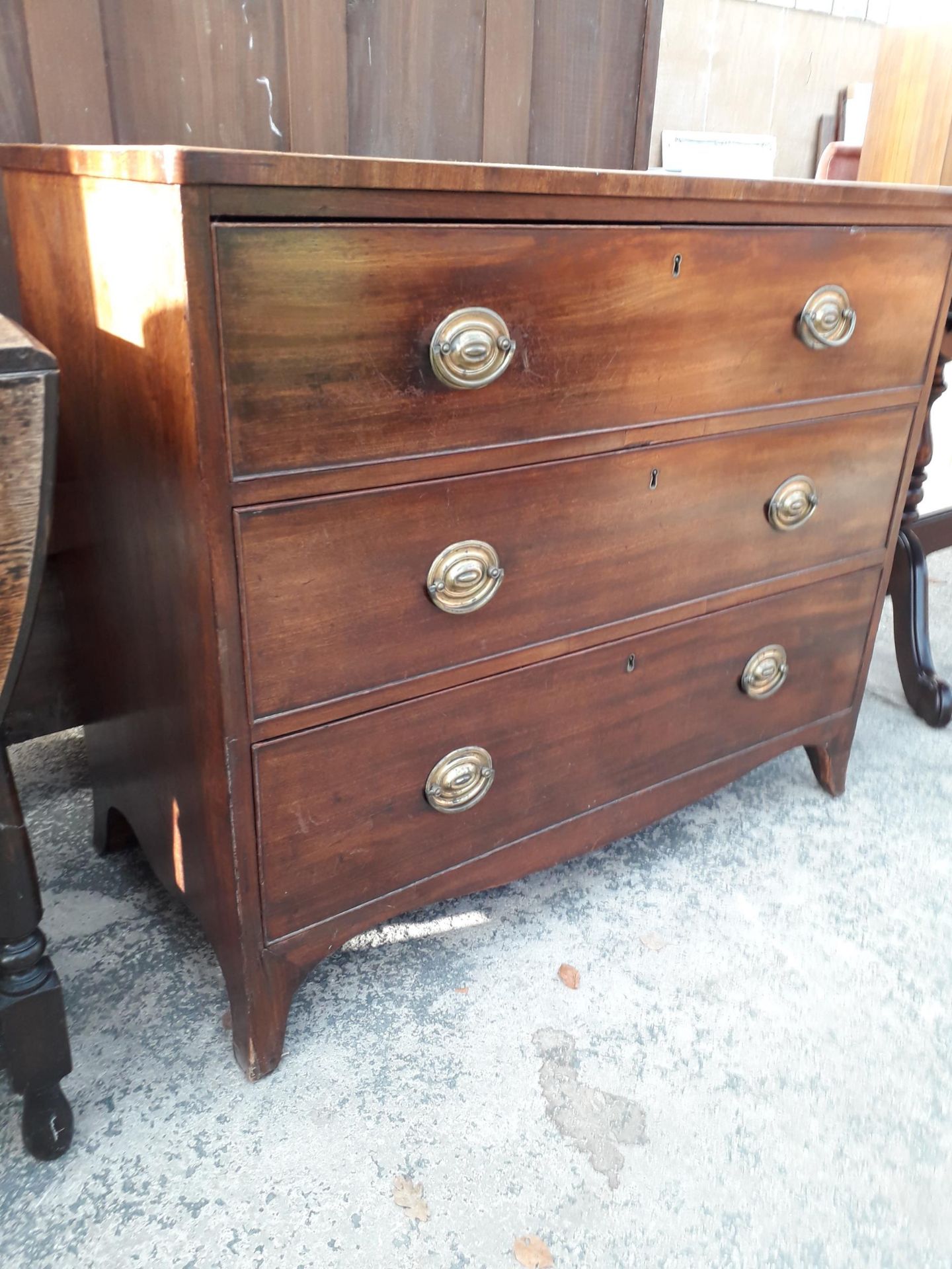 A GEORGE III MAHOGANY CHEST OF THREE GRADUATED DRAWERS, 39" WIDE - Image 2 of 3