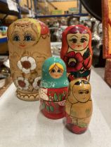 A SET OF FOUR RUSSIAN LACQUERED DOLLS