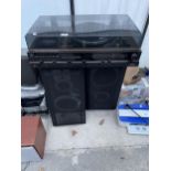 AN HITACHI STEREO MUSIC CENTRE AND A PAIR OF LARGE YAMAHA SPEAKERS