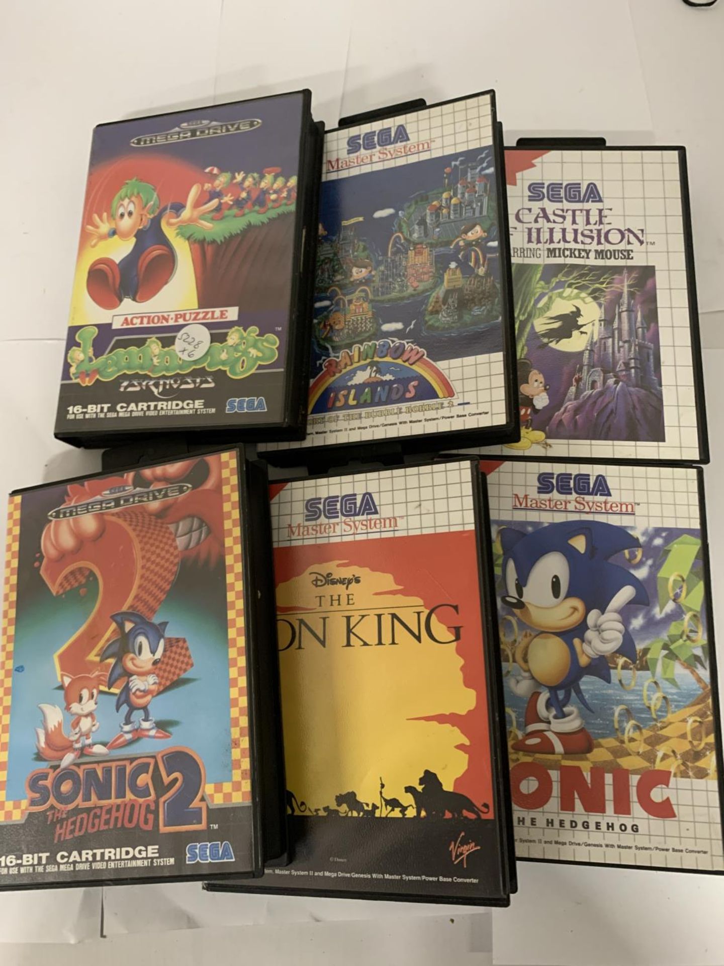 SIX BOXED GAMES TO INCLUDE SONIC THE HEDGEHGOG 2, SONIC THE HEDGEHOG, THE LION KING. SEGA CASTLE