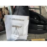 A CELESTRON TRAVEL TELESCOPE WITH CARRY BAG AND MANUAL