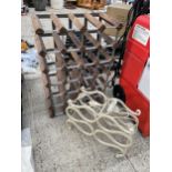 A 24 BOTTLE WOODEN AND METAL WINE RACK AND A FURTHER SIX BOTTLE WINE HOLDER