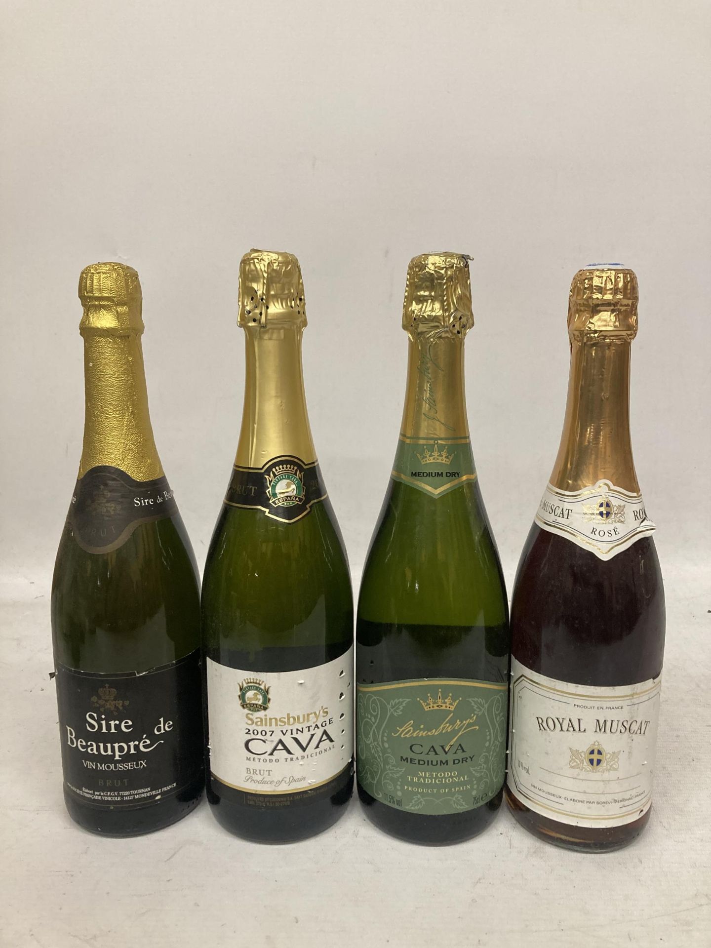 FOUR 75CL BOTTLES - 2 X CAVA, ROYAL MUSCAT ROSE AND SIRE DE BEAUPRE BRUT