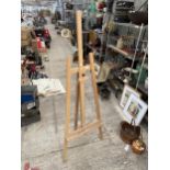 A LARGE WOODEN ARTISTS EASEL