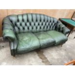 A GREEN LEATHER 'WINCHESTER FURNITURE' CHESTERFIELD THREE SEATER SETTEE