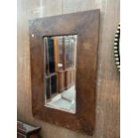 A MODERN WALL MIRROR IN LEATHER FRAME WITH BEVEL EDGE, 36 X 24"