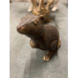 A SMALL BRONZE MODEL OF A MOUSE