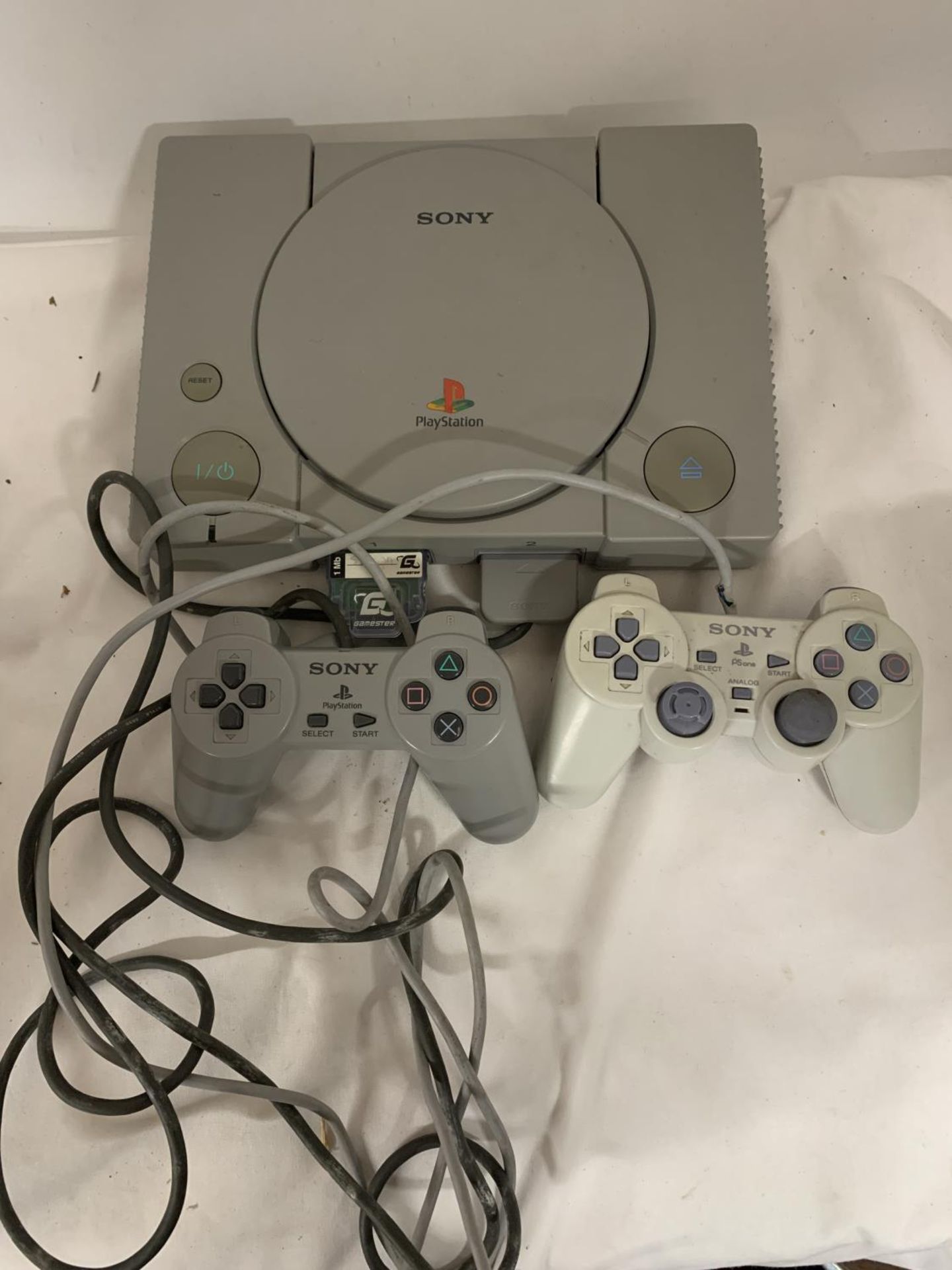 A BOXED SONY PLAYSTATION ONE DUAL SHOCK CONSOLE WITH TWO CONTROLLERS - Image 2 of 2