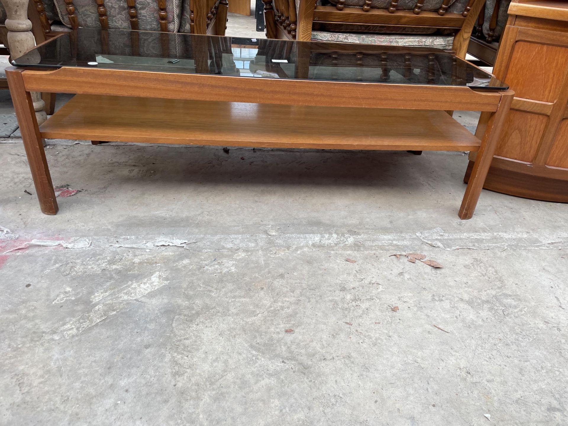 A RETRO TEAK TWO TIER COFFEE TABLE WITH SMOKED GLASS TOP, 44 X 19" - Image 2 of 2