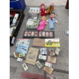 A COLLECTION OF VINTAGE ITEMS TO INCLUDE PUPPETS AND BOOKS ETC