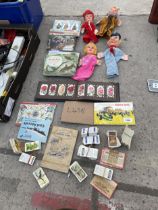 A COLLECTION OF VINTAGE ITEMS TO INCLUDE PUPPETS AND BOOKS ETC