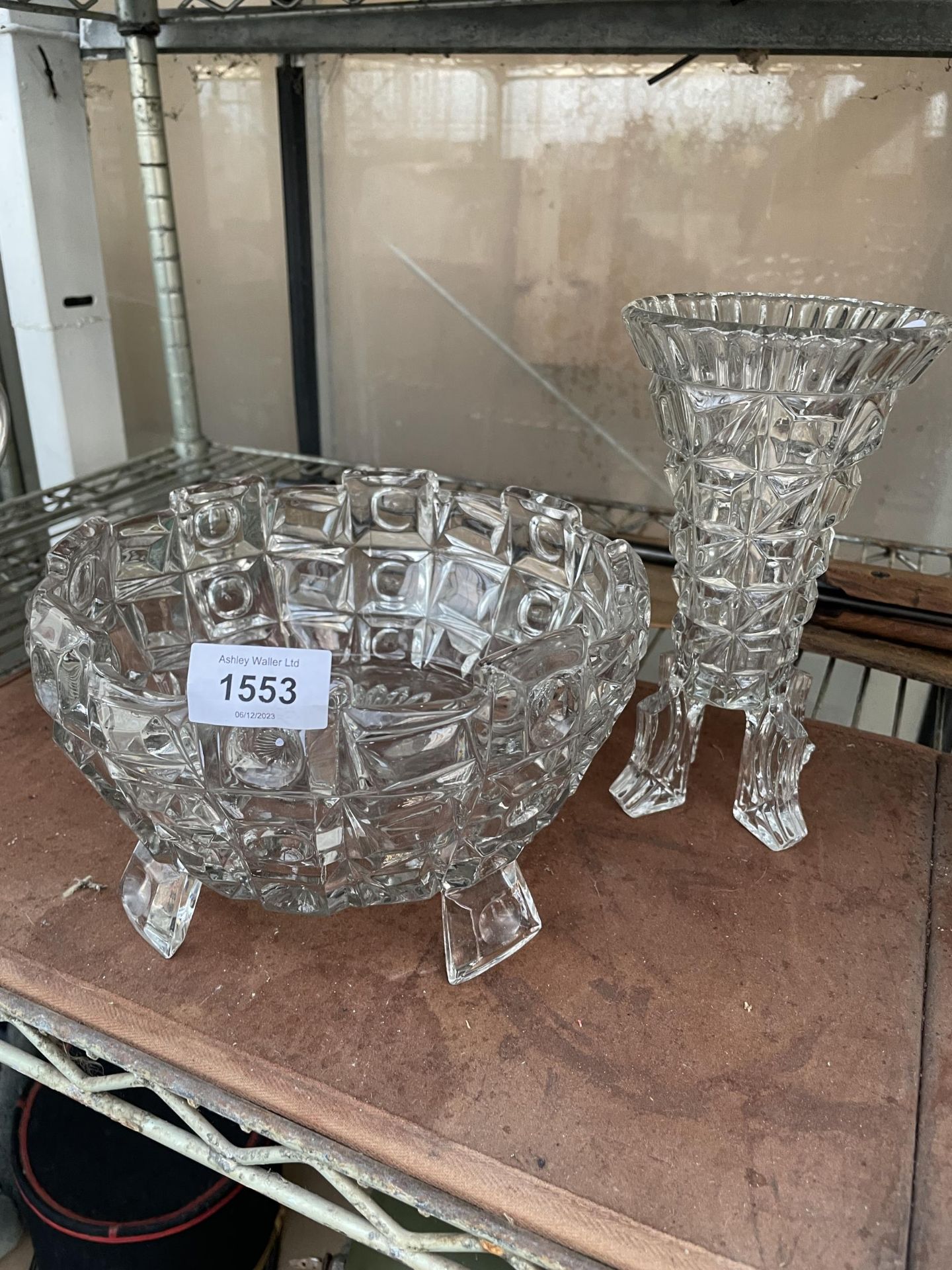 A HEAVY CUT GLASS BOWL AND VASE