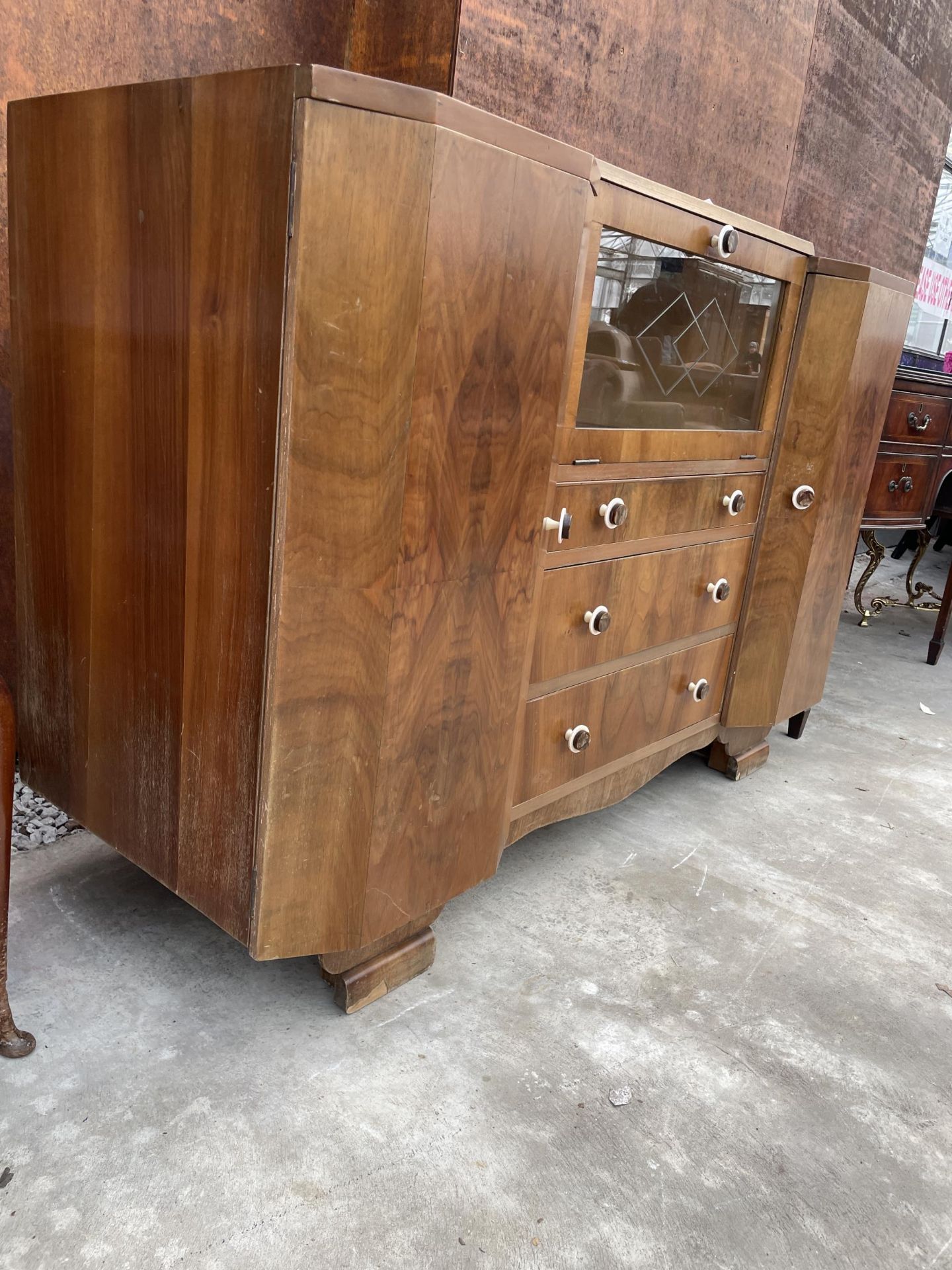 A WALNUT ART DECO COCKTAIL SIDEBOARD WITH MIRRORED DROP-DOWN FRONT, TWO CUPBOARDS AND THREE DRAWERS, - Image 2 of 4
