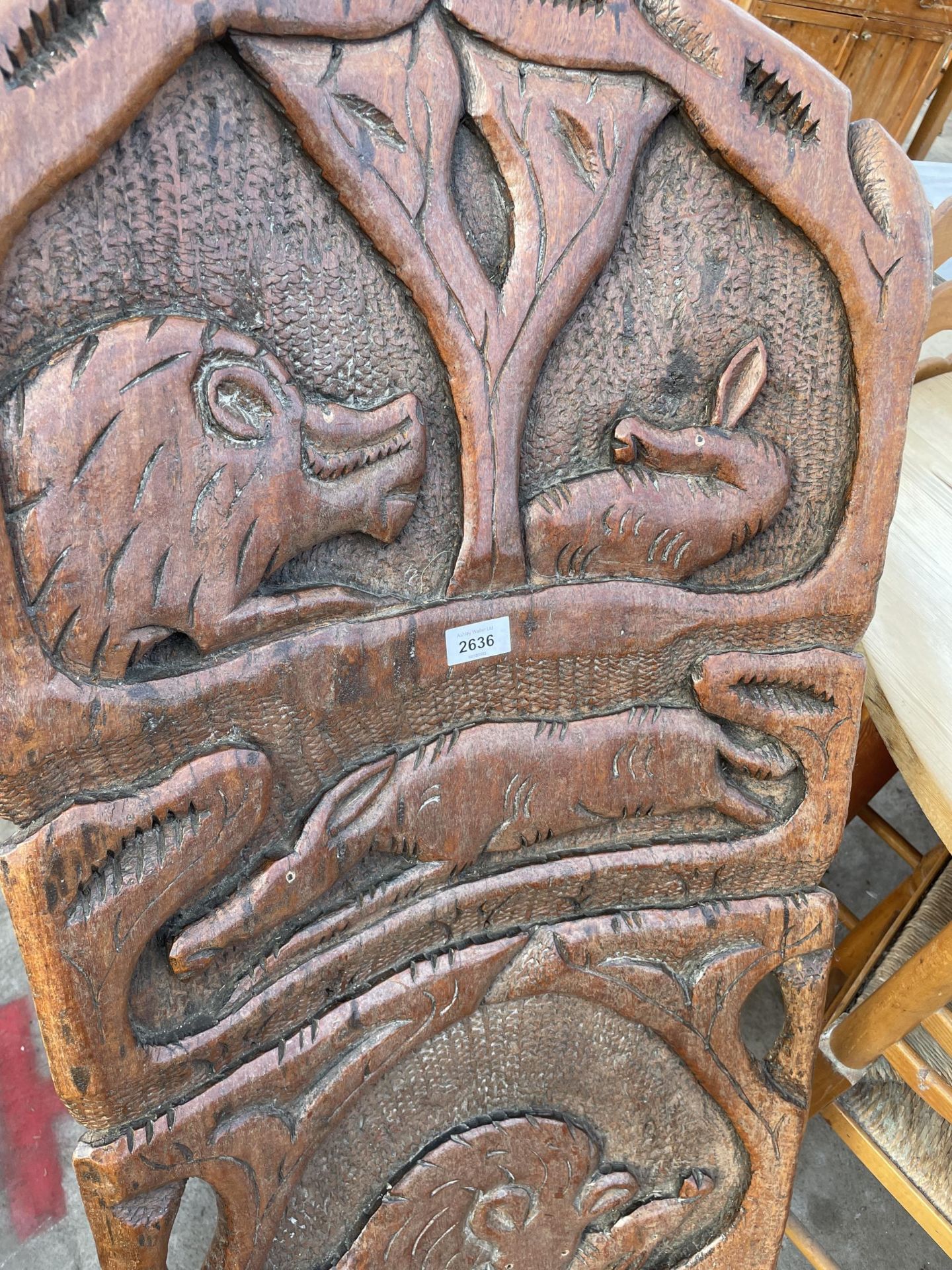 AN AFRICAN FOLDING TRIBAL CHAIR WITH WILD ANIMAL CARVINGS TO BACK - Image 3 of 4