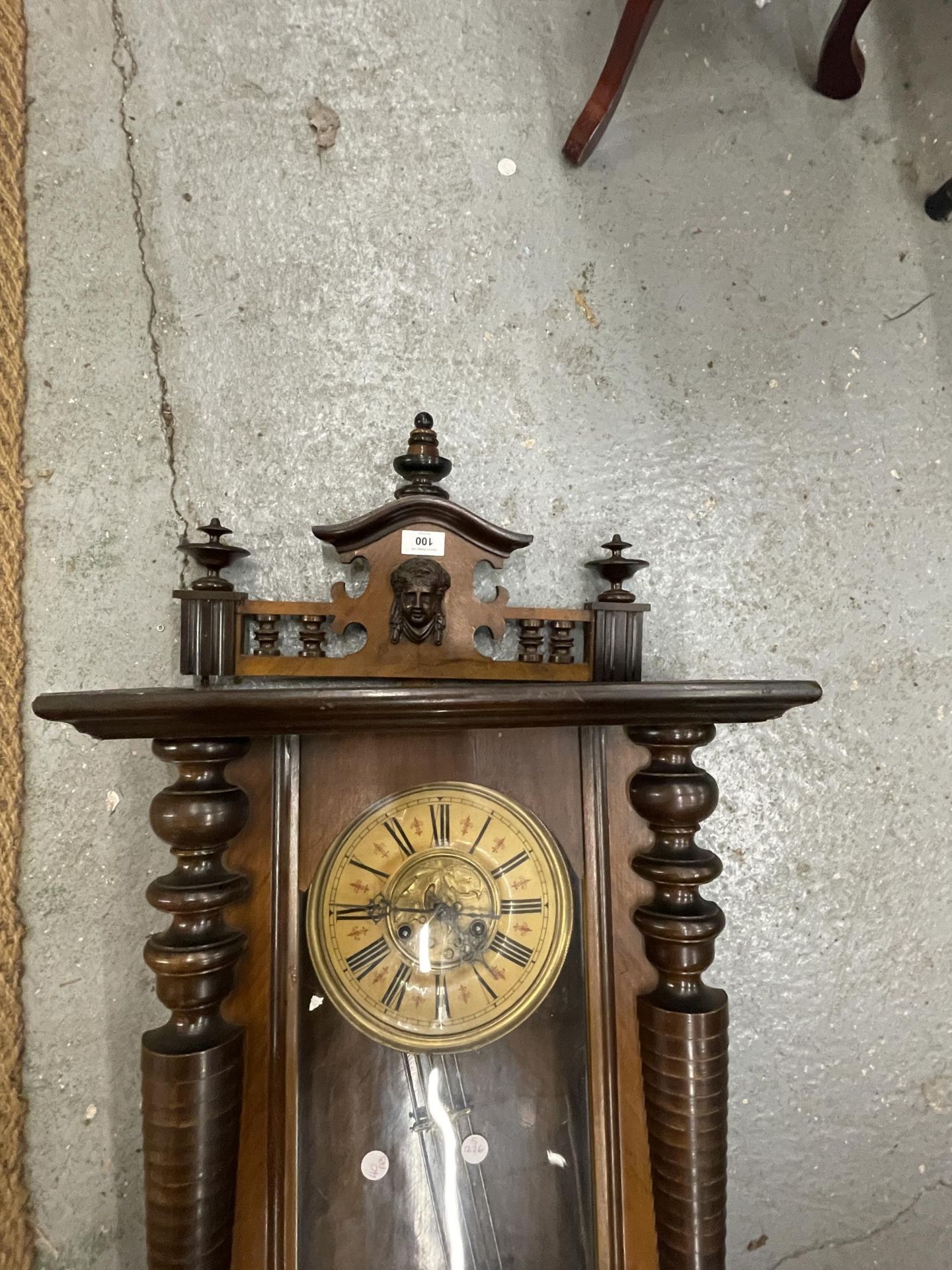 A CARVED WALNUT VIENNA WALL CLOCK WITH ROMAN NUMERALS AND PENDULUM - Image 2 of 5