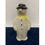 AN ANITA HARRIS HAND PAINTED AND SIGNED IN GOLD LUSTRE SNOWMAN FIGURE