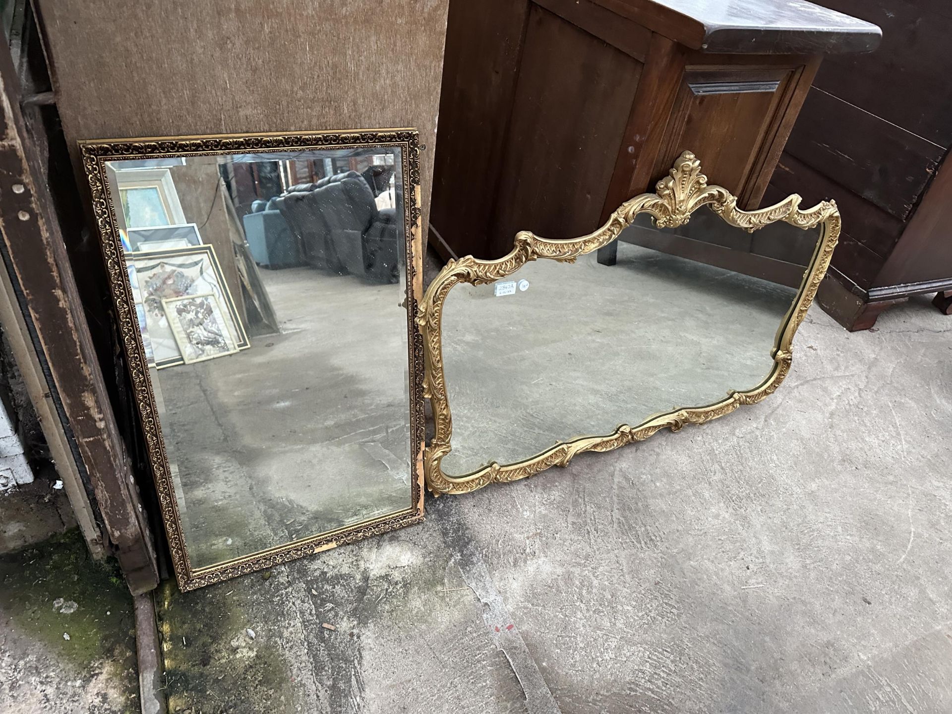 TWO GILT FRAMED WALL MIRRORS