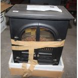 AN ELECTRIC FIRE IN THE FORM OF A LOG BURNER