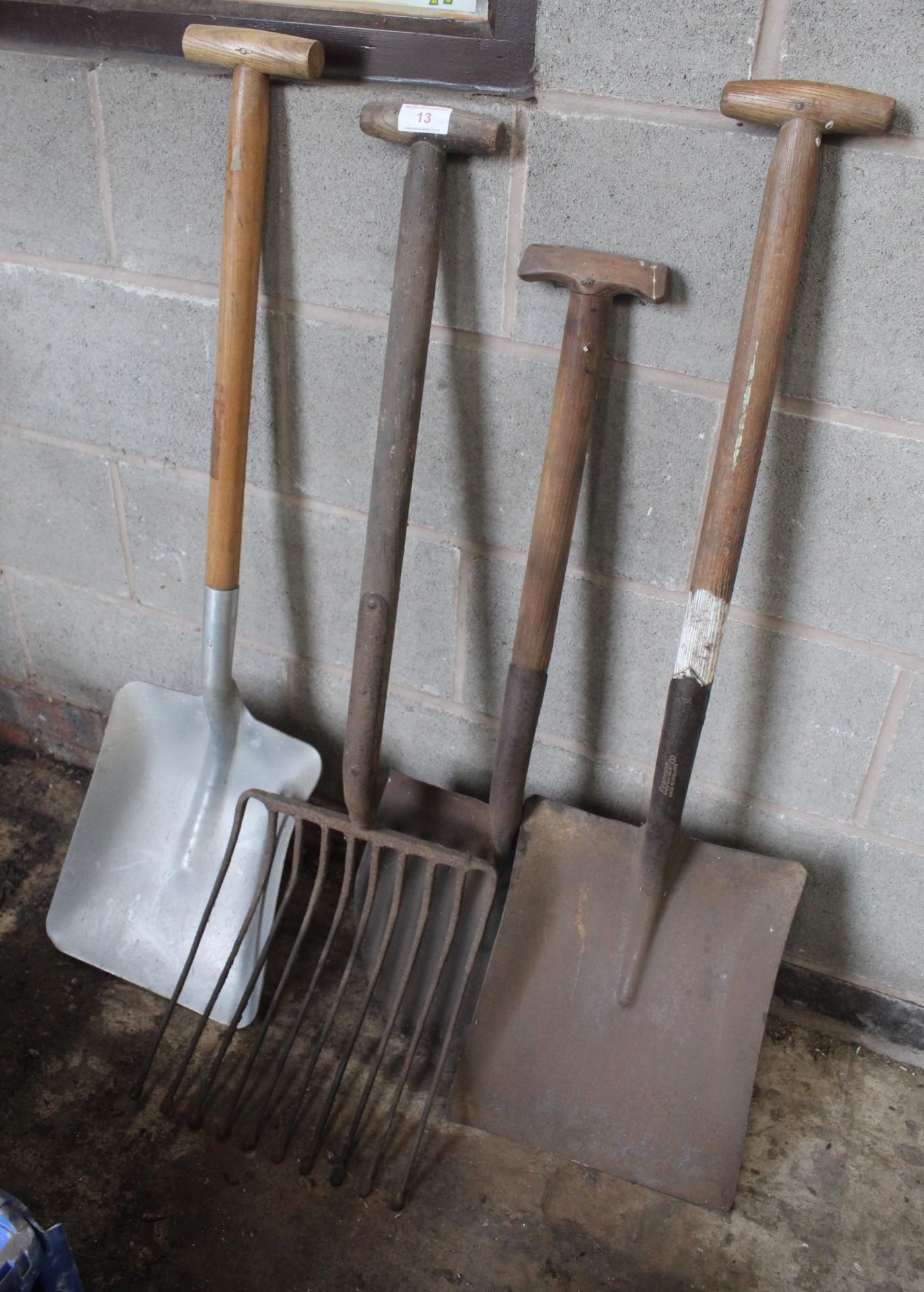 THREE SHOVELS, A POTATO FORK AND A BOX OF CANDLES (FORK HANDLES NOT 4 CANDLES)