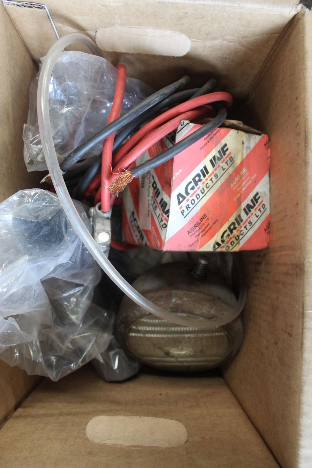 THREE BOXES OF ASSORTED TRACTOR SPARES TO INCLUDE MASSEY FERGUSON, INCLUDING HEAD LAMP, FILTERS - Image 2 of 2