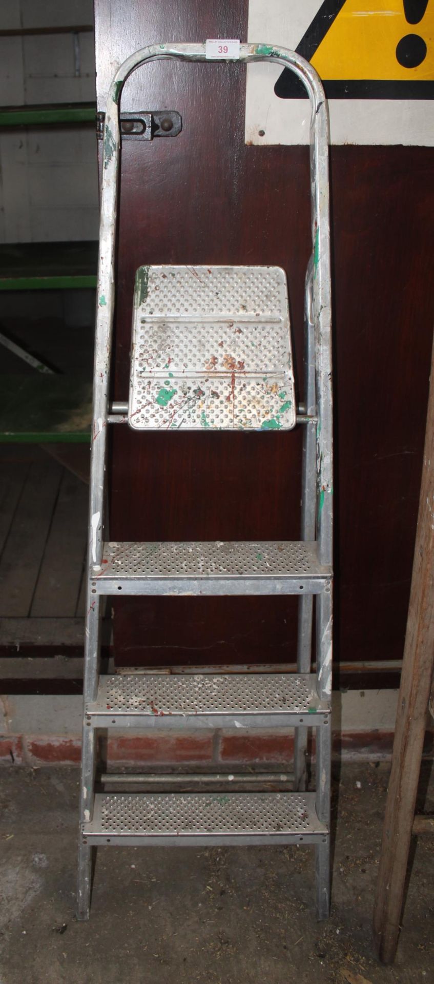 A THREE RUNG ALUMINIUM STEP LADDER