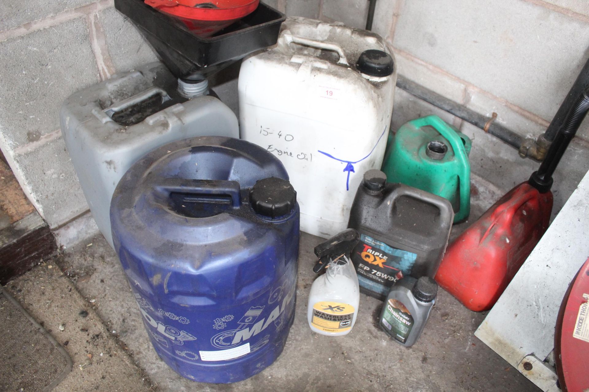 AN ASSORTMENT OF VARIOUS OIL TO INCLUDE CHAINSAW OIL AND BELIEVED TO BE 15-40 ENGINE OIL ETC