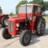 A MASSEY FERGUSON 35X TRACTOR WITH A DUNCAN CAB, REGISTRATION NO. 261 HAJ WITH A NEW BATTERY + LOG