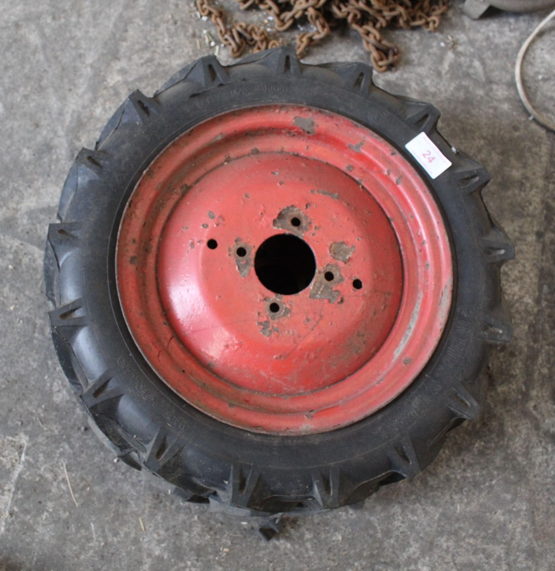 A PAIR OF ROTAVATOR WHEELS AND TYRES