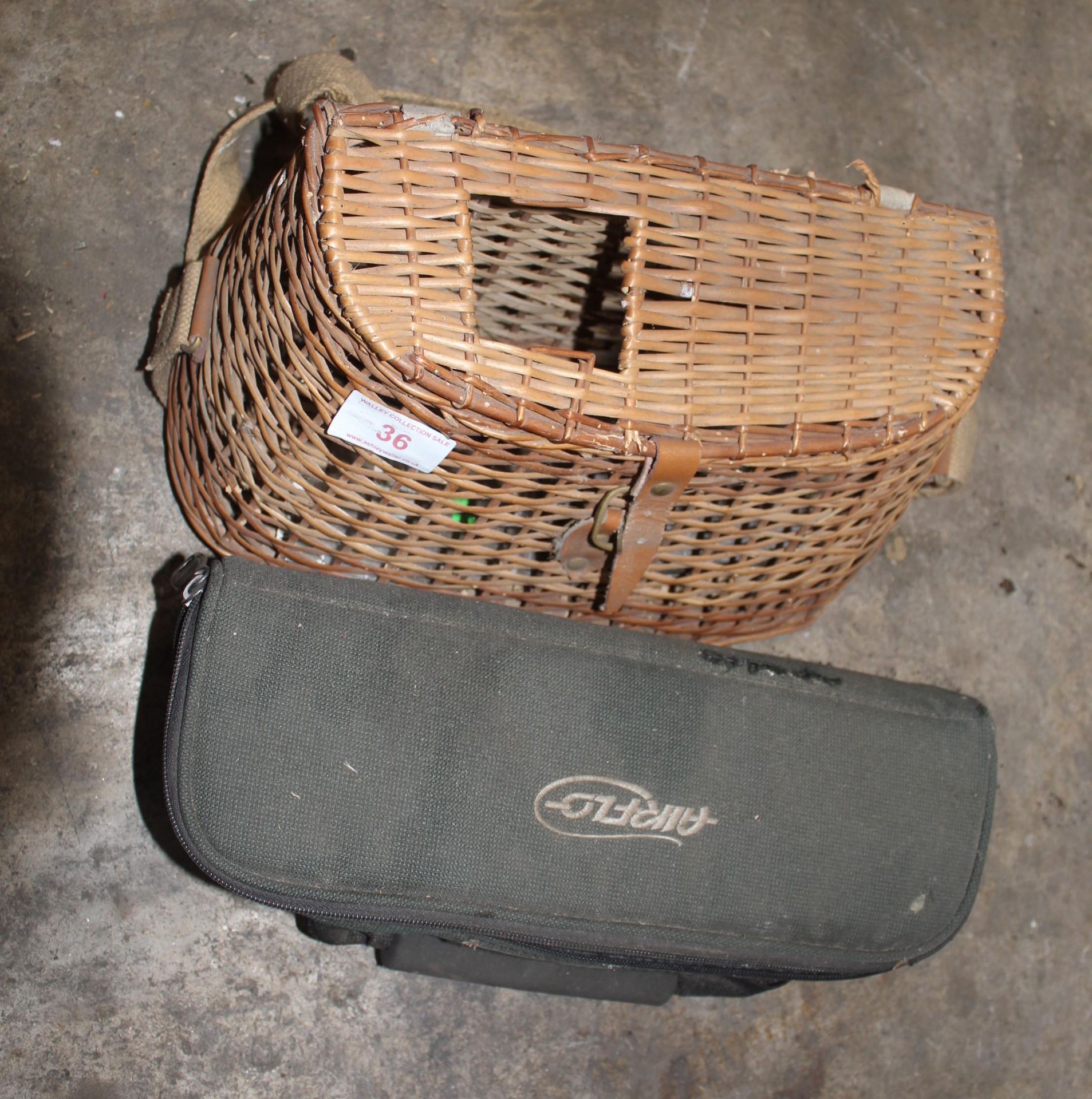 AN ASSORTMENT OF FISHING TACKLE TO INCLUDE A WICKER TACKLE BOX, FISHING LINE AND A LEAD MAKING