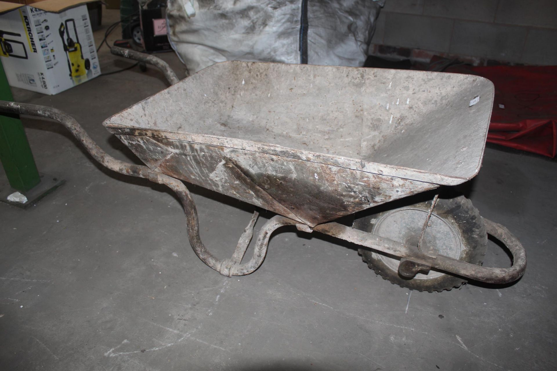 A METAL TWIN HANDLED GARDEN WHEEL BARROW