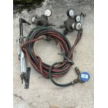 A SET OF GAS CUTTING PIPES, VALVES AND TORCH ETC NO VAT