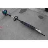 MAKITA EN4950H POLE HEDGECUTTER HARDLEY USED PLEASE NOTE THIS IS A 4 STROKE ENGINE MANUAL & TOOLS IN