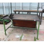 A GREEN METAL WORK BENCH WITH A RECORD NO 5 BENCH VICE + VAT