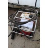 A COMPRESSOR WITH HONDA PETROL ENGINE COMPLETE WITH A PNEUMATIC BREAKER + VAT