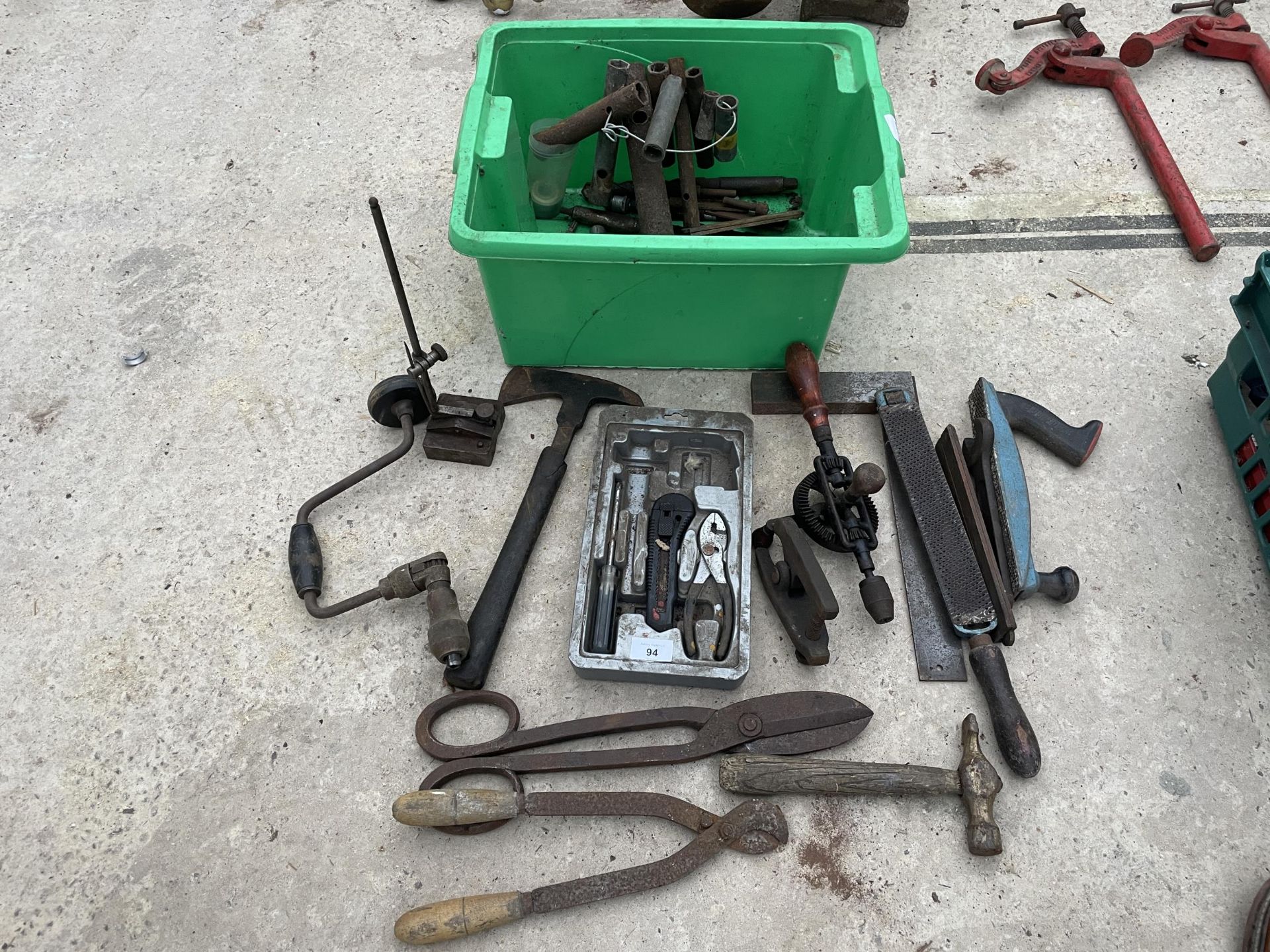 AN ASSORTMENT OF TOOLS TO INCLUDE PLIERS, RASPS AND AN AXE ETC NO VAT