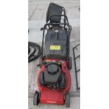 A LASER CHAMPION MOWER AND A CHAMPION MOWER NO VAT