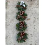 FOUR BOW AND CONE WREATHS WITH VARIOUS COLOURED BOWS + VAT TO BE SOLD FOR THE FOUR