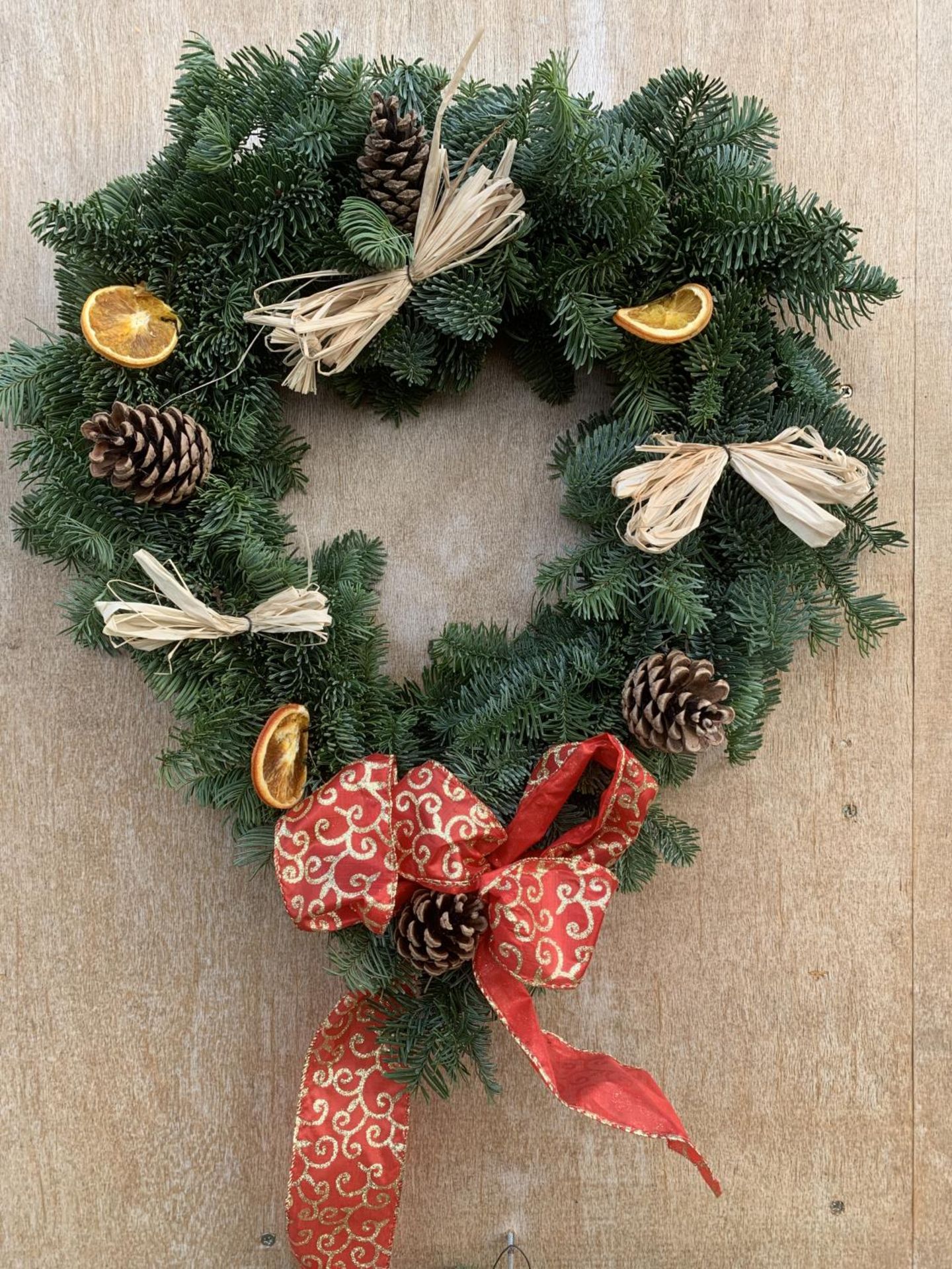 TWO HEART SHAPED WREATHS WITH ORANGE, RAFIA, CONE AND RIBBON + VAT TO BE SOLD FOR TWO - Image 6 of 8