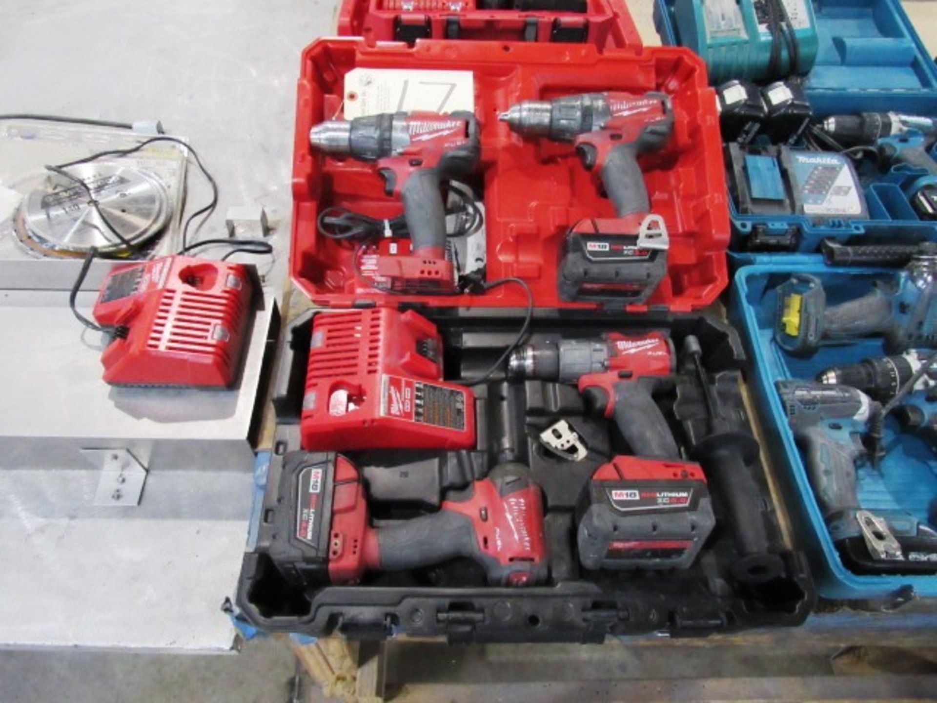 (3) Milwaukee Drills, (1) Driver, (3) Batteries, (2) Chargers