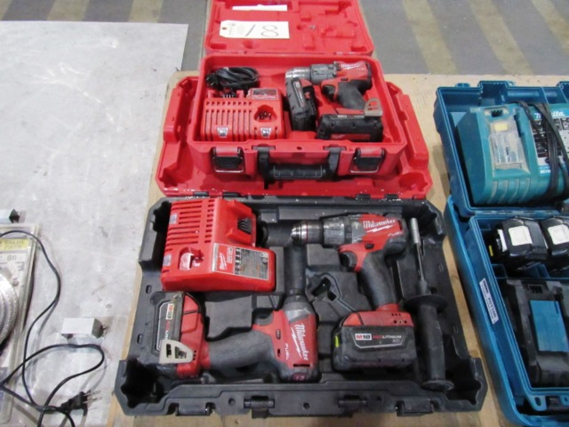 (2) Milwaukee Drills, (1) Driver, (3) Batteries, (2) Chargers