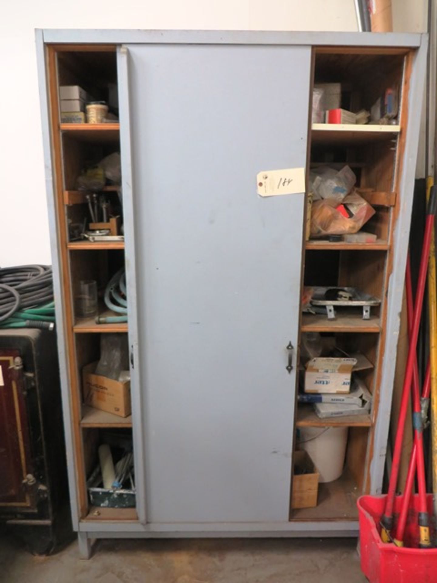 2 Door Wood Cabinet with Some Wood Working & Electric Supplies