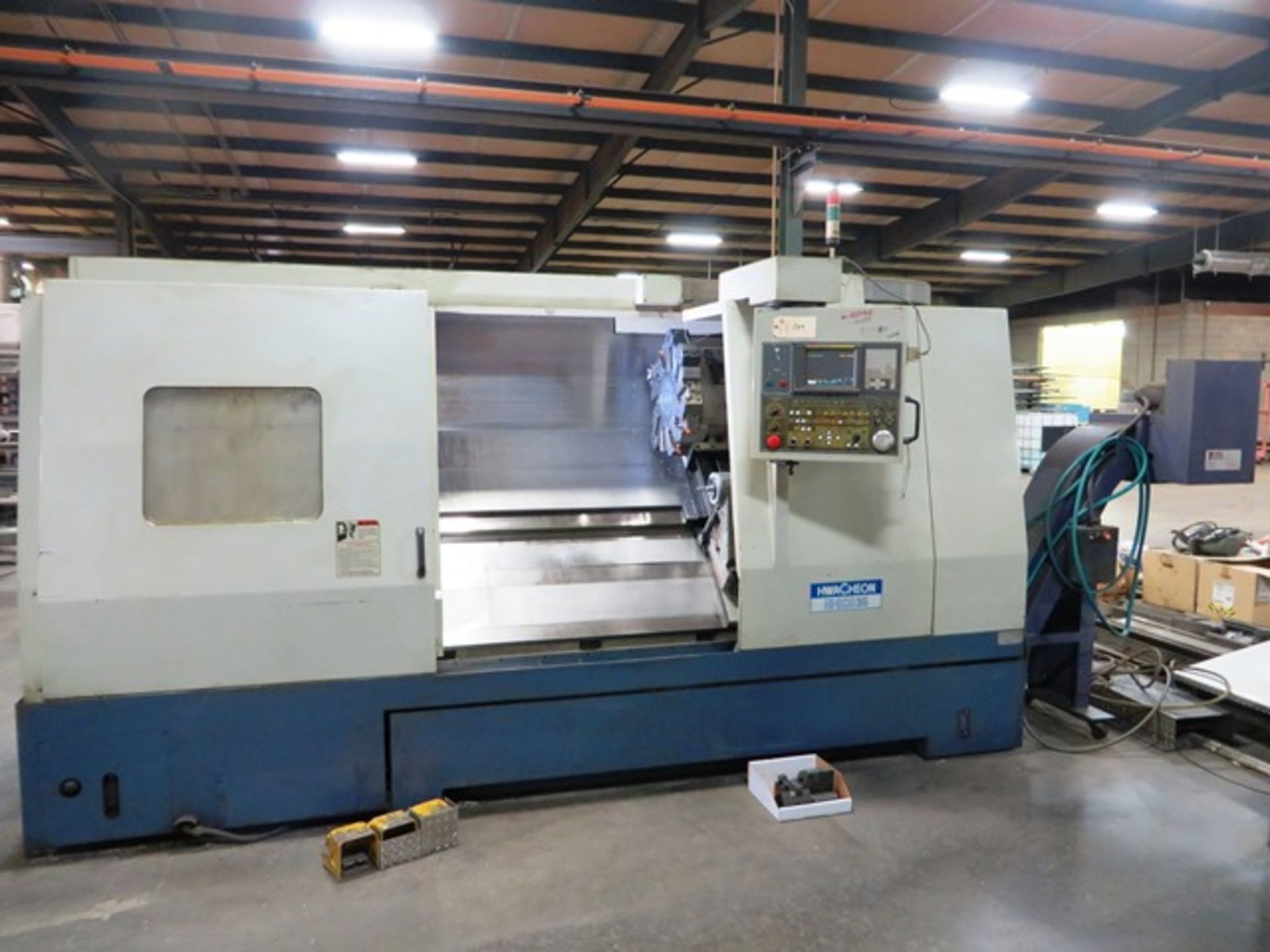 Hwacheon Hi-ECO 35 CNC Turning Center with 12'' 3-Jaw Chuck, 10 Position Turret, Approx. 4'' Bore,