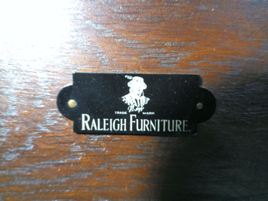 An oak monk's bench with lift up seat and carved detailing, marked 'Raleigh Furniture', length - Image 7 of 9