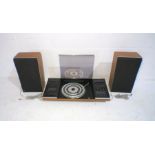 A Bang & Olufsen Beocenter 2002 turntable with tape deck along with a pair of Bang & Olufsen